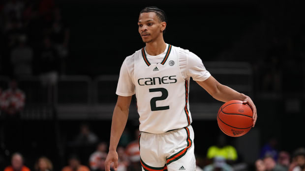 guard Isaiah Wong (2) dribbles the ball up the court against the Virginia Tech Hokies during the second half at Watsco Center.